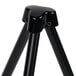 A black steel Universal portable tabletop easel with a black tripod base.