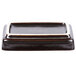 A rectangular Tuxton China sauce dish in black and white.