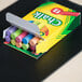 A box of Crayola drawing chalk with 12 assorted colors.