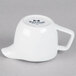 A Tuxton bright white china creamer with a handle.