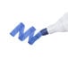 A Universal desk style dry erase marker with a blue cap is being used to write the letter m.