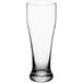 An Acopa clear Pilsner glass on a white background.