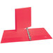 A red binder with silver metal rings.
