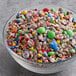 A white bowl filled with Chopped Cocoa Gems.