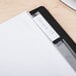 A file folder with Avery Clear Insertable Tab Dividers inside.