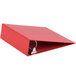 A red Universal economy non-stick binder with 3" round rings and a clip.