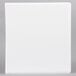 A white Universal Comfort Grip Deluxe Plus binder with black text on the cover on a gray surface.