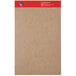 A Universal narrow ruled writing pad with a brown cardboard cover and red label.