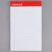 A close up of a Universal narrow ruled white notepad.