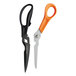 Two Fiskars scissors with black and orange handles.