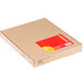 A brown box with a red label containing Universal white 5-tab divider sets.