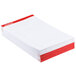 A stack of white Universal Legal Rule writing pads with perforated edges.