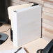 A white Universal economy non-stick view binder on a desk.