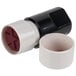 A Universal 3/4" round red pre-inked star stamp with a black and white plastic lid.