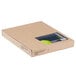 A brown box with a green and black label with a card inside.
