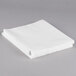 A stack of white paper in a Universal clear sheet protector.