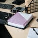 A black Universal economy view binder on a desk with a notebook, pen, and keyboard.
