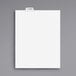 A white rectangular paper tab with a black border and tape on the bottom.