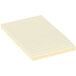 A Universal yellow lined self-stick note pad.