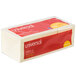 A yellow Universal self-stick note pack on a white countertop.