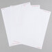 A group of white paper labels with red writing on them.