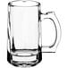 A clear glass Acopa beer mug with a handle.