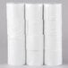 A stack of white Universal Office calculator paper rolls.