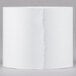 A white Universal Office calculator paper roll on a white surface.