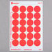 A package of white paper with red circles of Avery round removable labels.