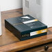 A Southworth 24# white business paper box on a table.