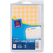 A package of Avery neon orange color coding labels with yellow dots.