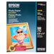 A box of Epson glossy photo paper with 100 sheets inside.