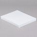 A stack of Epson glossy photo paper.
