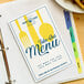A binder with a menu for Avery half-fold greeting cards on it.