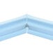 The blue plastic corner of a Delfield 1702003 equivalent door gasket.