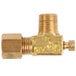 An Avantco brass pilot valve with a nut on it.