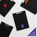 A group of black Choice menu holders with different logos on them.