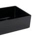 A black rectangular Cal-Mil melamine box on a counter.