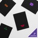A group of black rectangular menu holders with different colored logos.