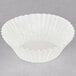 A white Hoffmaster fluted mini baking cup.