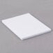 A stack of white rectangular Avery laser address labels.