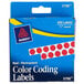 A blue box of Avery red round color coding labels with white labels inside.