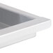 A white metal rectangular Avantco grease tray with a handle.