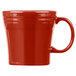 A Fiesta Scarlet china mug with a handle.