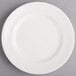 A white Reserve by Libbey porcelain plate with a thin rim.