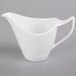 A white Royal Rideau porcelain creamer with a handle.