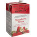 A carton of Monin Strawberry Fruit Smoothie Mix with a white background.