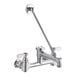 A silver Regency wall-mounted mop sink faucet with a long handle.