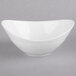 A white bowl with a curved edge.