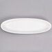 A white oval porcelain tray.